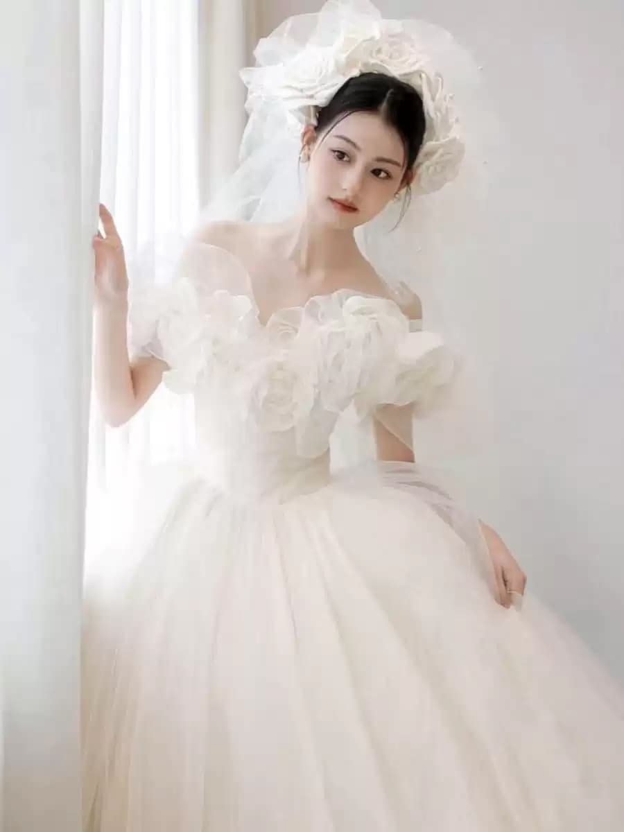 Off-the-shoulder French-style lightweight bridal gown an ethereal dreamy and premium-quality dress