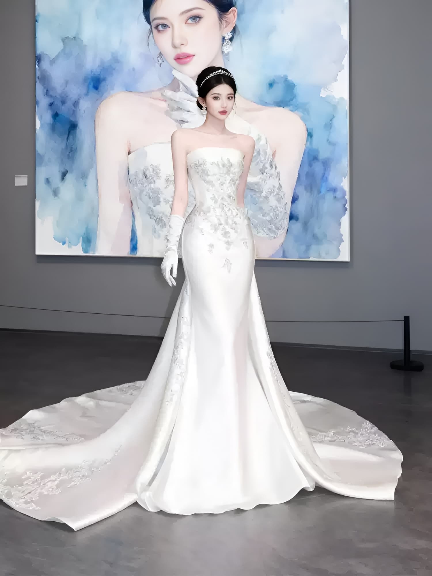 French-style strapless light wedding dress featuring an elegant satin mermaid silhouette