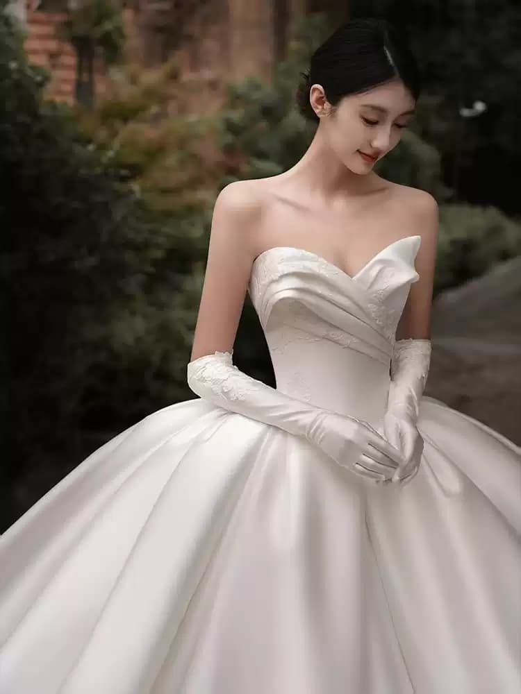 Strapless Satin Dress with Premium Texture Slim-Fit Design featuring a Simple Long Train and Delicate Sheer Overlay